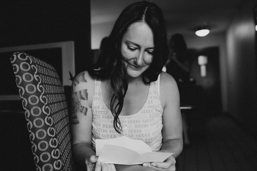 Bride crying reading letter from groom