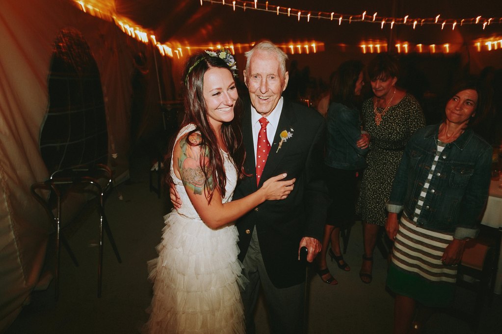 Bride dancing with grandfather